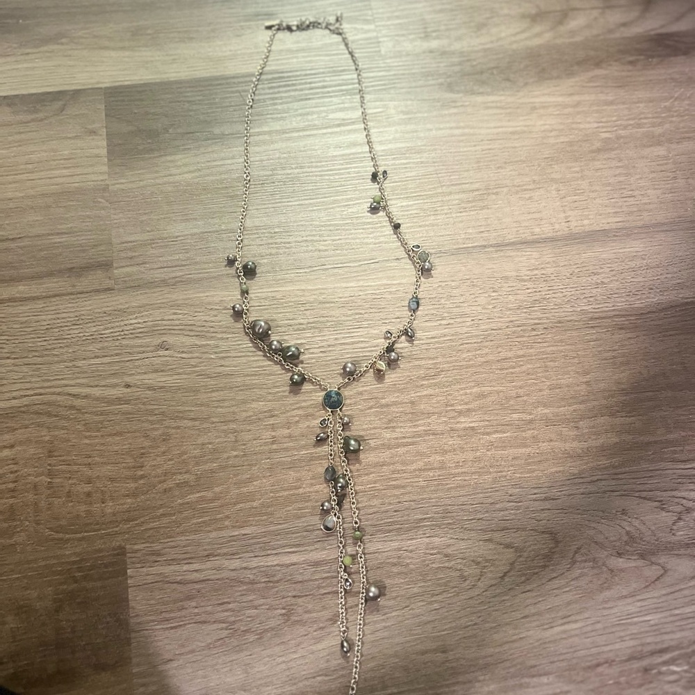 Elegant Gold and Silver Dangle Necklace